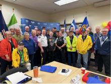 Group of COP volunteers with RCMP members